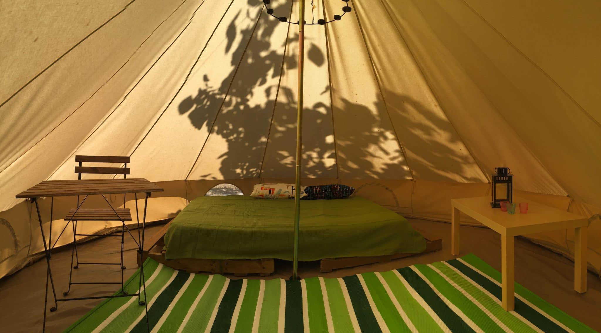 Glamping tent interior camping armanello benidorm scaled